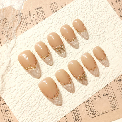 Nude and Gold Press on Nails | 3D Bow Charm, "Melted" Gold, Pearl White Textured Nails, Coquette Nails, Elegant Bridal Fake Nails