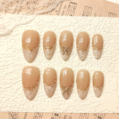 Nude and Gold Press on Nails | 3D Bow Charm, "Melted" Gold, Pearl White Textured Nails, Coquette Nails, Elegant Bridal Fake Nails