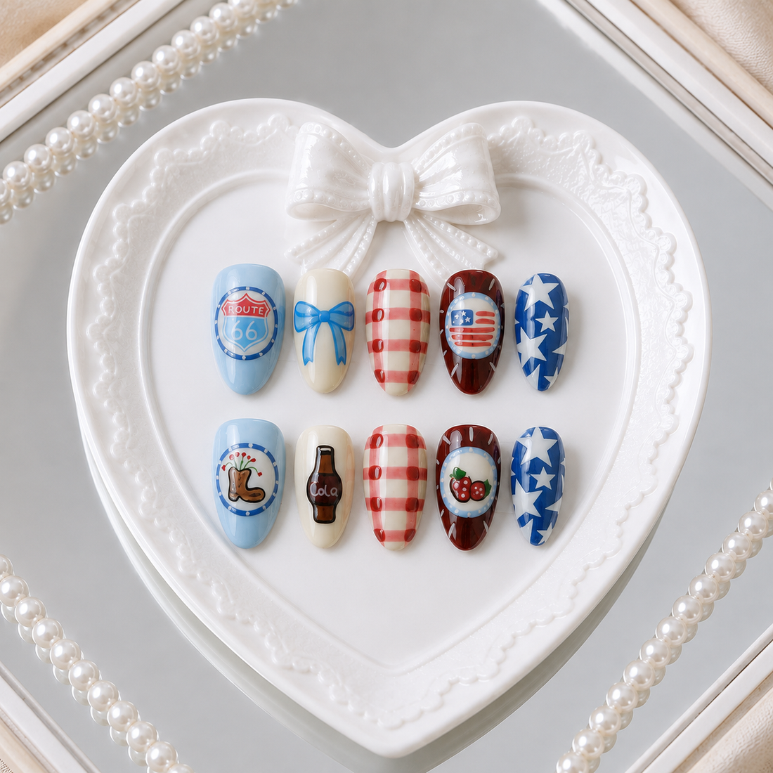 Americana Darling press-on nail set in a pearl heart mirror setting