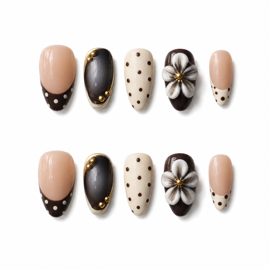Cocoa Camellia short almond press-on nails on a clean white background