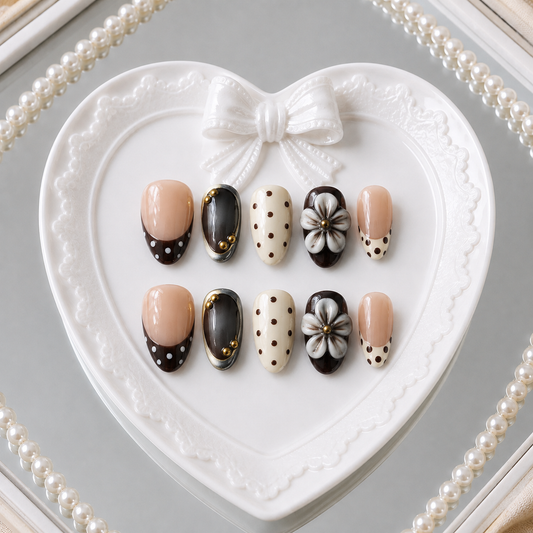Cocoa Camellia press-on nail set in a pearl heart mirror setting